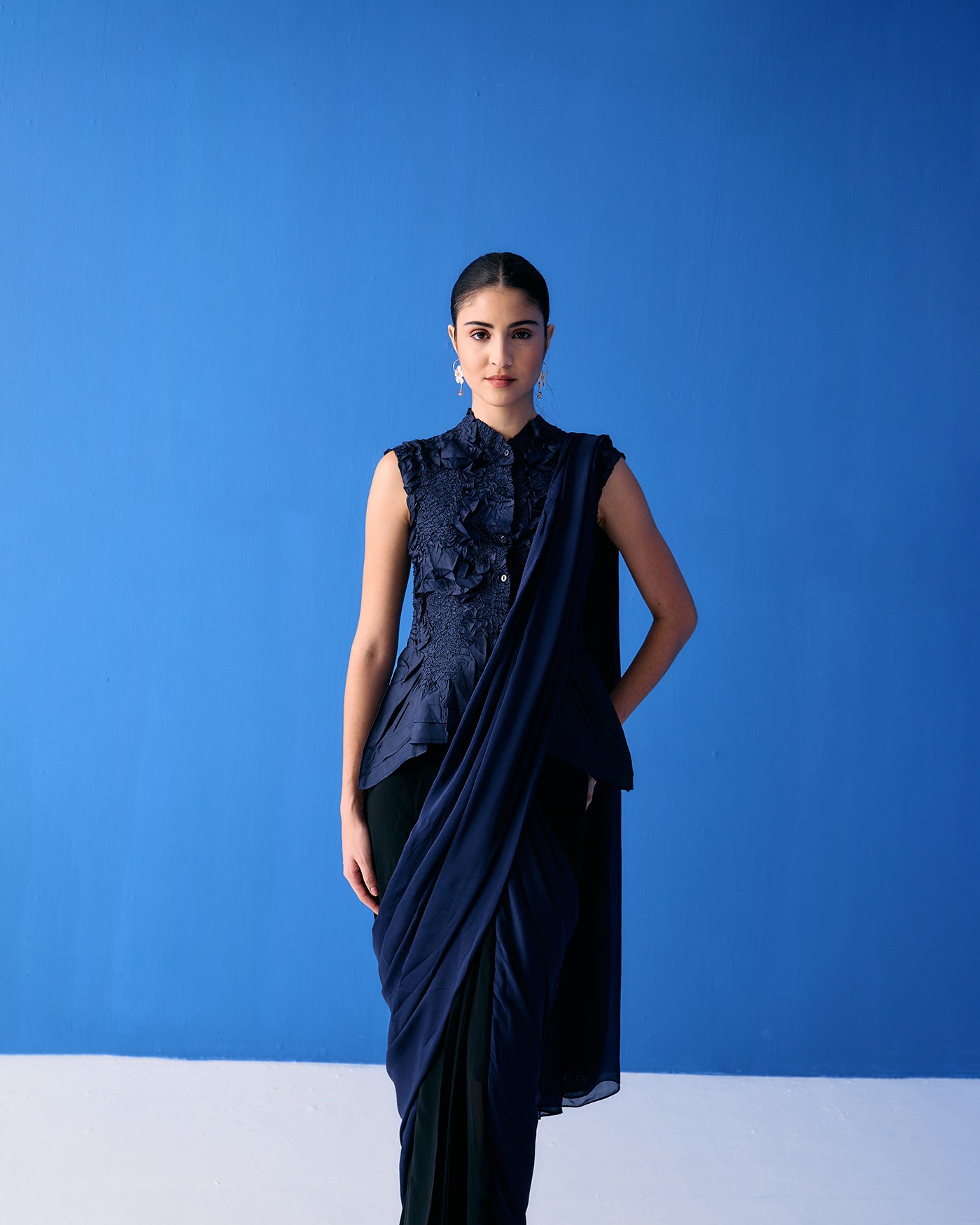 Blue Crinkled Top Paired With Black And Blue Saree