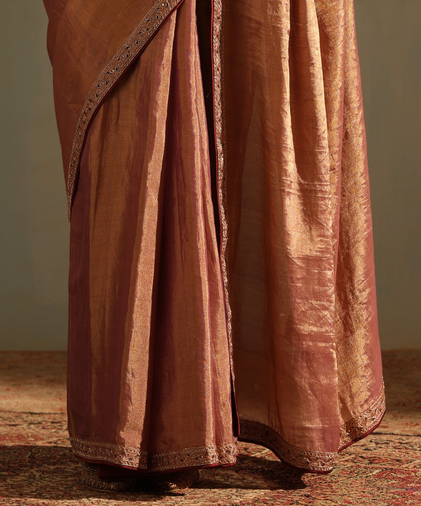 Purple And Golden Hand Embroidered Tissue Silk Saree