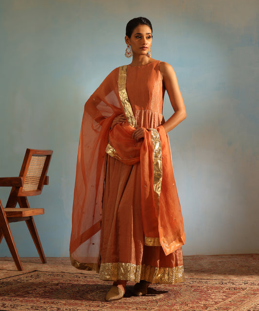 Orange Handcrafted Tissue Silk Anarkali Kurta With Churidaar And Organza Dupatta